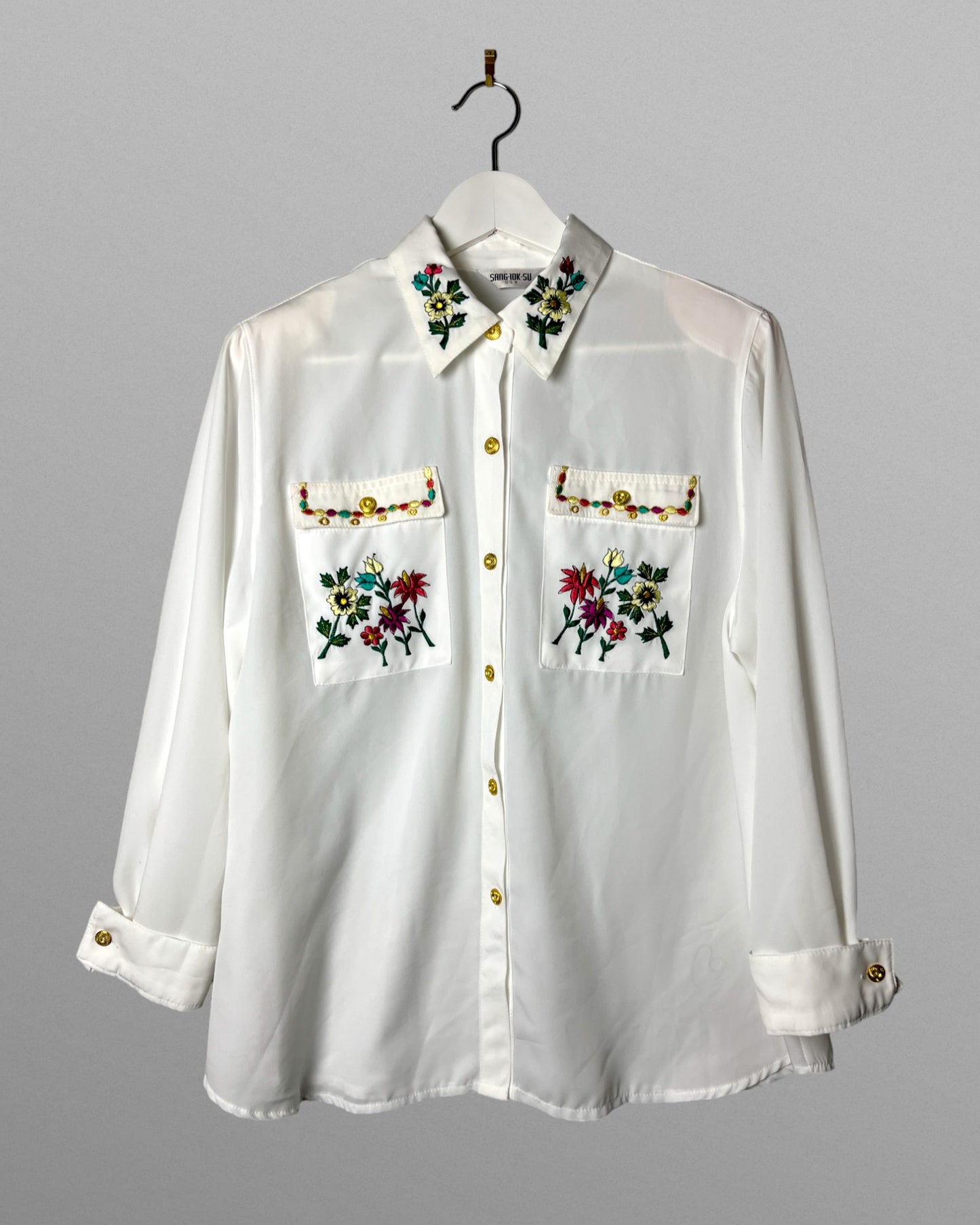 Blus med broderier